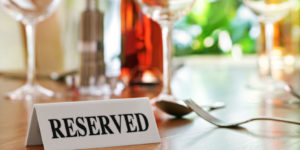 24913974 - reserved sign on a restaurant table